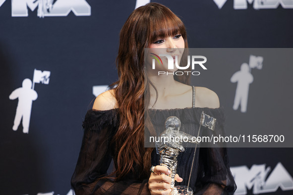 Lisa (Lalisa Manobal) of Blackpink, winner of the Best K-Pop award for 'Rockstar' poses in the press room at the 2024 MTV Video Music Awards...