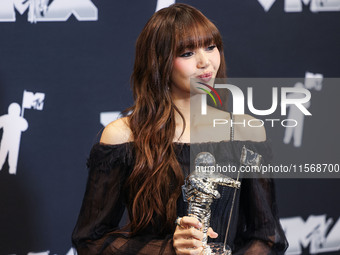 Lisa (Lalisa Manobal) of Blackpink, winner of the Best K-Pop award for 'Rockstar' poses in the press room at the 2024 MTV Video Music Awards...