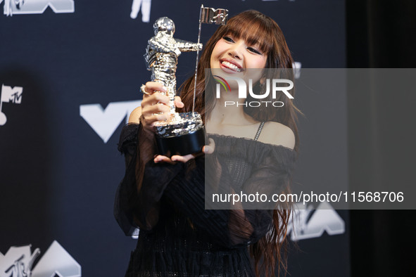 Lisa (Lalisa Manobal) of Blackpink, winner of the Best K-Pop award for 'Rockstar' poses in the press room at the 2024 MTV Video Music Awards...