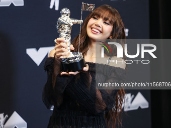 Lisa (Lalisa Manobal) of Blackpink, winner of the Best K-Pop award for 'Rockstar' poses in the press room at the 2024 MTV Video Music Awards...