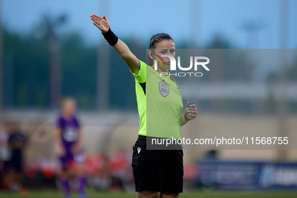 UEFA appoints match referee Sofik Torosyan, who gestures during the UEFA Women's Champions League First qualifying round, Semi-finals CP-Gro...