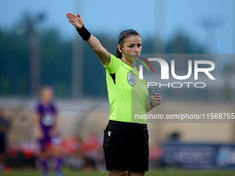 UEFA appoints match referee Sofik Torosyan, who gestures during the UEFA Women's Champions League First qualifying round, Semi-finals CP-Gro...