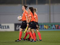 In Ta' Qali, Malta, on September 4, 2024, UEFA-appointed match referee Louise Thompson leads her two assistant referees and the fourth offic...