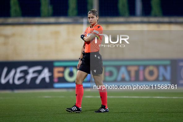 Martina Molinaro, the UEFA-appointed fourth official, stands prior to the UEFA Women's Champions League First qualifying round, Semi-finals...