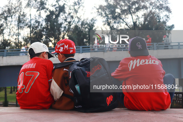 Diablos Rojos del Mexico kids celebrate the Diablos Rojos' 17th championship of the Mexican Baseball League (LMB) during the victory parade...