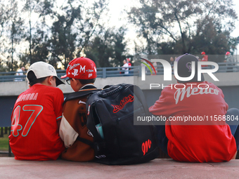 Diablos Rojos del Mexico kids celebrate the Diablos Rojos' 17th championship of the Mexican Baseball League (LMB) during the victory parade...