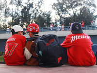 Diablos Rojos del Mexico kids celebrate the Diablos Rojos' 17th championship of the Mexican Baseball League (LMB) during the victory parade...