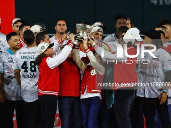 Team Diablos Rojos del Mexico celebrates the 17th championship of the Mexican Baseball League (LMB) during the victory parade at the Alfredo...