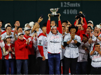 Trevor Bauer lifts the Zaachila cup celebrating The Diablos Rojos del Mexico 17th championship of the Mexican Baseball League (LMB) during t...