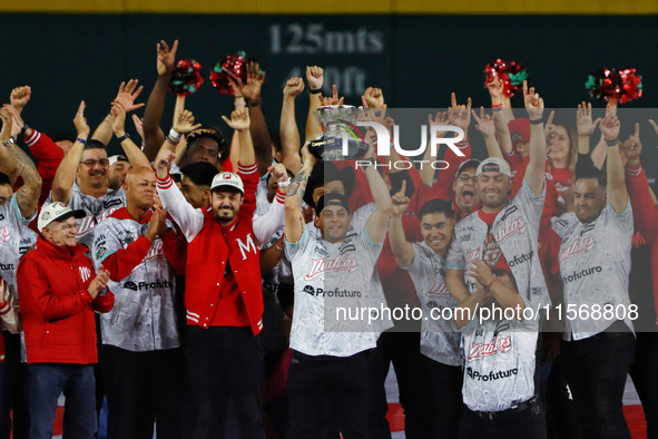 Juan Carlos Gamboa lifts the Zaachila cup celebrating The Diablos Rojos del Mexico 17th championship of the Mexican Baseball League (LMB) du...