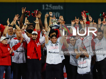 Juan Carlos Gamboa lifts the Zaachila cup celebrating The Diablos Rojos del Mexico 17th championship of the Mexican Baseball League (LMB) du...