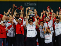 Juan Carlos Gamboa lifts the Zaachila cup celebrating The Diablos Rojos del Mexico 17th championship of the Mexican Baseball League (LMB) du...