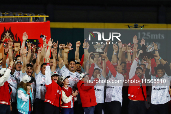 Team Diablos Rojos del Mexico celebrates the 17th championship of the Mexican Baseball League (LMB) during the victory parade at the Alfredo...