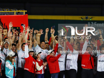 Team Diablos Rojos del Mexico celebrates the 17th championship of the Mexican Baseball League (LMB) during the victory parade at the Alfredo...