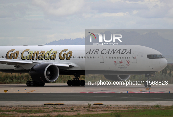 Air Canada Boeing 777-333(ER) with special Go Canada Go livery flies members of the Olympic and Paralympic teams to the Paris Games and carr...