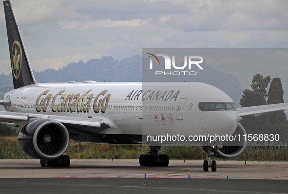 Air Canada Boeing 777-333(ER) with special Go Canada Go livery flies members of the Olympic and Paralympic teams to the Paris Games and carr...