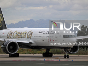 Air Canada Boeing 777-333(ER) with special Go Canada Go livery flies members of the Olympic and Paralympic teams to the Paris Games and carr...