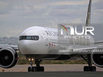 Air Canada Boeing 777-333(ER) with special Go Canada Go livery flies members of the Olympic and Paralympic teams to the Paris Games and carr...