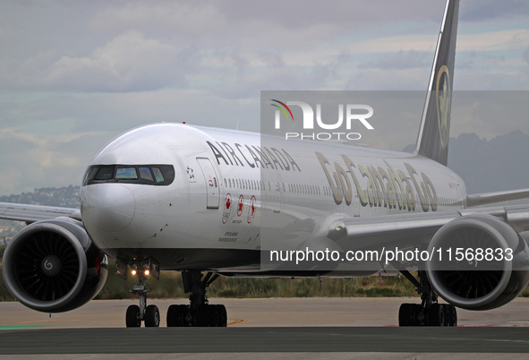 Air Canada Boeing 777-333(ER) with special Go Canada Go livery flies members of the Olympic and Paralympic teams to the Paris Games and carr...