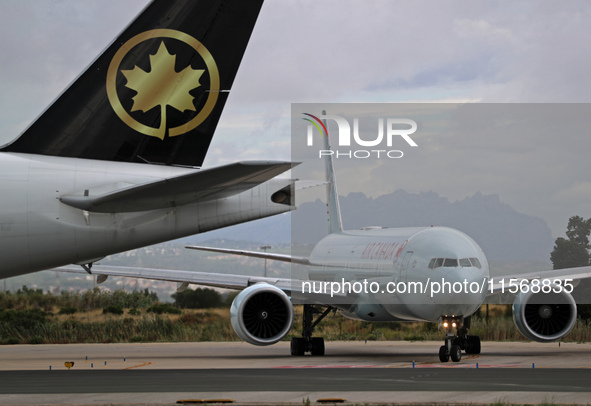 Air Canada Boeing 777-333(ER) with special Go Canada Go livery flies members of the Olympic and Paralympic teams to the Paris Games and carr...