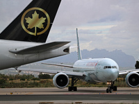 Air Canada Boeing 777-333(ER) with special Go Canada Go livery flies members of the Olympic and Paralympic teams to the Paris Games and carr...