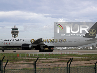 Air Canada Boeing 777-333(ER) with special Go Canada Go livery flies members of the Olympic and Paralympic teams to the Paris Games and carr...