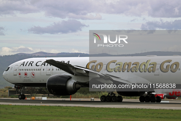 Air Canada Boeing 777-333(ER) with special Go Canada Go livery flies members of the Olympic and Paralympic teams to the Paris Games and carr...