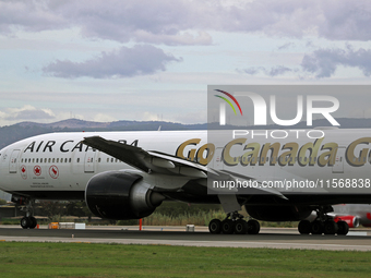 Air Canada Boeing 777-333(ER) with special Go Canada Go livery flies members of the Olympic and Paralympic teams to the Paris Games and carr...