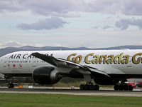 Air Canada Boeing 777-333(ER) with special Go Canada Go livery flies members of the Olympic and Paralympic teams to the Paris Games and carr...