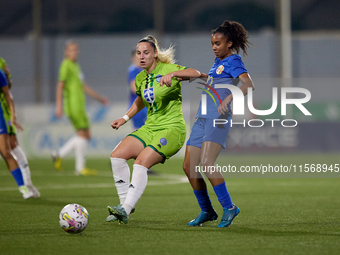 Luana Vitoria Lourenco Cabral (R) of Birkirkara competes for the ball with Enida Bosnjak (L) of Breznica during the UEFA Women's Champions L...