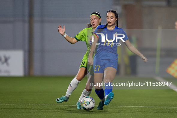 Valentina Rapa of Birkirkara (front) is closely followed by Tatjana Osmajic (back) of Breznica during the UEFA Women's Champions League Firs...