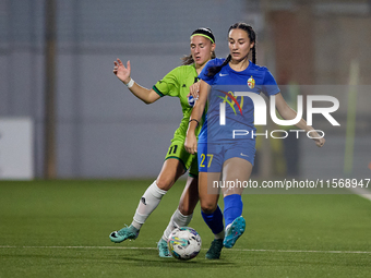 Valentina Rapa of Birkirkara (front) is closely followed by Tatjana Osmajic (back) of Breznica during the UEFA Women's Champions League Firs...