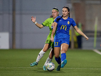 Valentina Rapa of Birkirkara (front) is closely followed by Tatjana Osmajic (back) of Breznica during the UEFA Women's Champions League Firs...