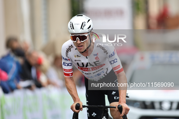 Marc Hirschi (SUI - UAE Team Emirates) passes under the finish line in Peccioli, Italy, on September 12, 2024, during the 72nd Tour of Tusca...