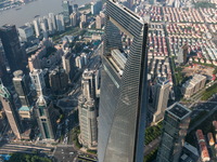 An aerial photo shows high-rise buildings along the Huangpu River in Lujiazui, Shanghai, China, on May 19, 2017. (