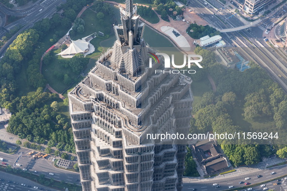 An aerial photo shows high-rise buildings along the Huangpu River in Lujiazui, Shanghai, China, on May 19, 2017. 