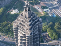 An aerial photo shows high-rise buildings along the Huangpu River in Lujiazui, Shanghai, China, on May 19, 2017. (