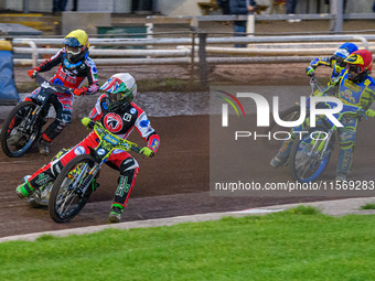 Belle Vue Colts' William Cairns in White leads Belle Vue Colts' Harry McGurk in Yellow, Sheffield Tiger Cubs' Kean Dicken in Red, and Sheffi...