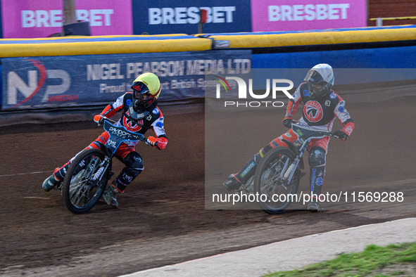 Belle Vue Colts' Freddy Hodder in yellow leads teammate Matt Marson in white during the WSRA National Development League match between Sheff...