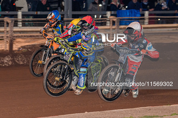 Belle Vue Colts' Freddy Hodder in white rides inside Sheffield Tiger Cubs' Nathan Ablitt in red, Belle Vue Colts' William Cairns in yellow,...