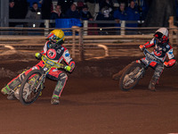 Belle Vue Colts' William Cairns in yellow leads teammate Freddy Hodder in white during the WSRA National Development League match between Sh...