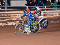 Nathan Ablitt of Sheffield Tiger Cubs in red leads Matt Marson of Belle Vue Colts in white during the WSRA National Development League match...