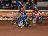 Nathan Ablitt of Sheffield Tiger Cubs in red leads Matt Marson of Belle Vue Colts in white during the WSRA National Development League match...