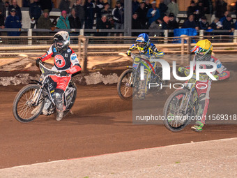 Belle Vue Colts' Matt Marson in white and Belle Vue Colts' William Cairns in yellow lead Sheffield Tiger Cubs' Jamie Etherington in blue dur...