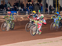 Belle Vue Colts' William Cairns in white leads Belle Vue Colts' Harry McGurk in yellow, Sheffield Tiger Cubs' Ace Pijper in red, and Sheffie...