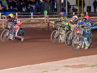 Nathan Ablitt of the Sheffield Tiger Cubs in Red rides inside William Cairns of the Belle Vue Colts in White, with Ace Pijper of the Sheffie...