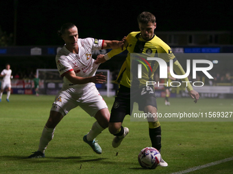 Harrogate Town's Josh March holds off Doncaster Rovers's Jamie Sterry during the Sky Bet League 2 match between Harrogate Town and Doncaster...