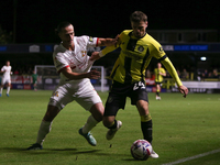 Harrogate Town's Josh March holds off Doncaster Rovers's Jamie Sterry during the Sky Bet League 2 match between Harrogate Town and Doncaster...