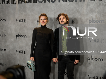 Andrea Guasch and Rosco attend the photocall for Vogue Fashion's Night Out 2024 in Madrid, Spain, on September 13, 2024. (