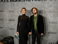 Andrea Guasch and Rosco attend the photocall for Vogue Fashion's Night Out 2024 in Madrid, Spain, on September 13, 2024. (